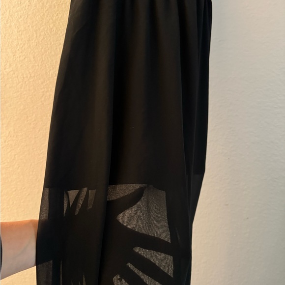 Maxi black dress with cut out parts and see thru top layer - Picture 2 of 4